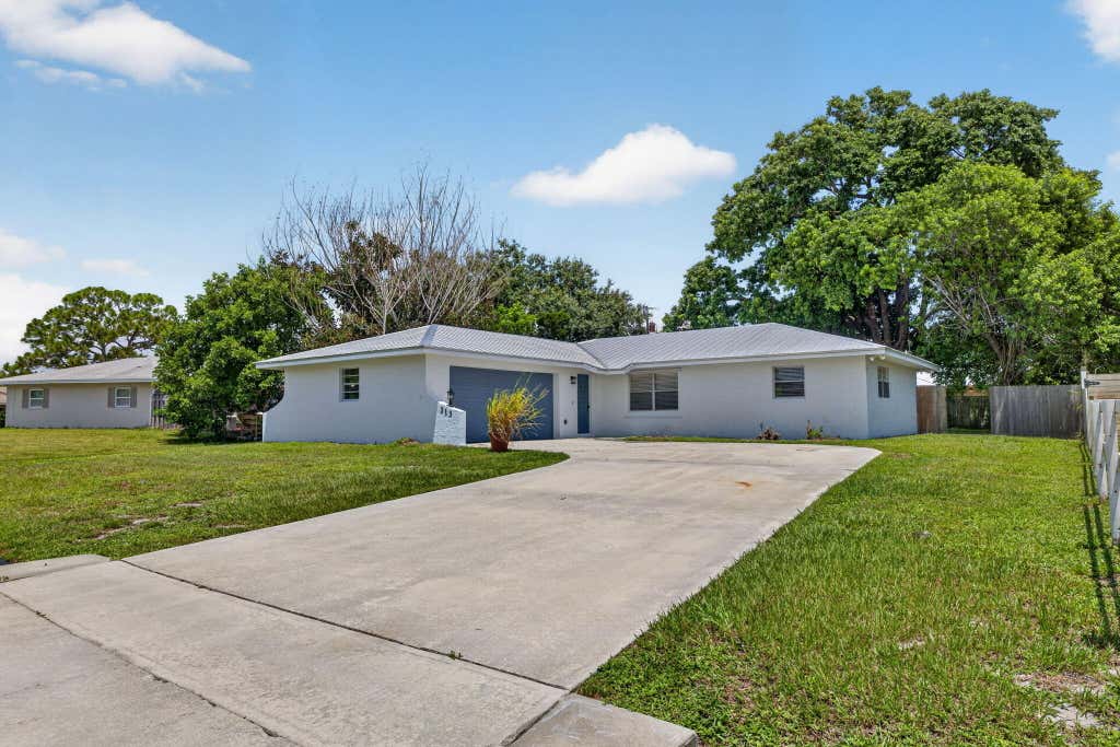 Photo of 313 SE Atlas Terrace, Port Saint Lucie, FL 34983 (MLS # B26058573)