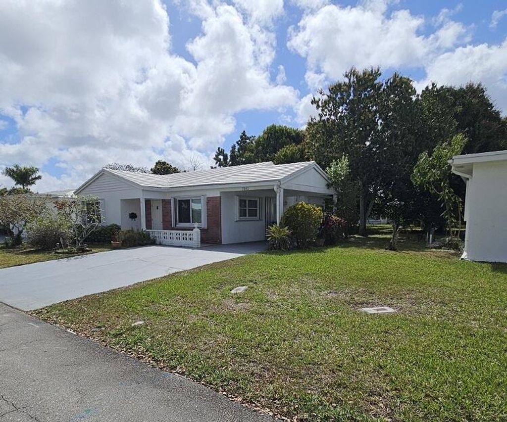 Photo of 7202 NW 73rd Street, Tamarac, FL 33321 (MLS # B26002459)