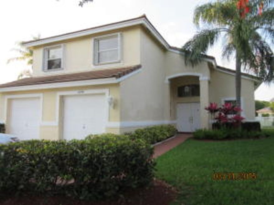 LOVELY NAIROBI MODEL 2 STORY HOME WITH A HUGE SIDE LOT AND PARTIAL LAKEVIEWS. THE FIRST FLOOR HAS CERAMIC TILE,UPGRADED KITCHEN APPLIANCES AND A BUILT IN ENTERTAINMENT AREA IN THE FAMILY ROOM. THE SECOND FLOOR LOFT AREA HAS A CUSTOM BUILT IN DESK AND AMPLE ROOM FOR A RELAXING SEATING AREA. ALSO UPSTAIRS IS THE MASTER AND 2 OTHER BEDROOMS AND 2 FULL BATHS. MASTER BEDROOM HAS A WONDERFUL VIEW OF THE LAKE. COME SEE WHY THIS HOME SHOULD BE YOUR NEXT HOME!!!! SIZES OF ROOMS ARE APPROXIMATE.