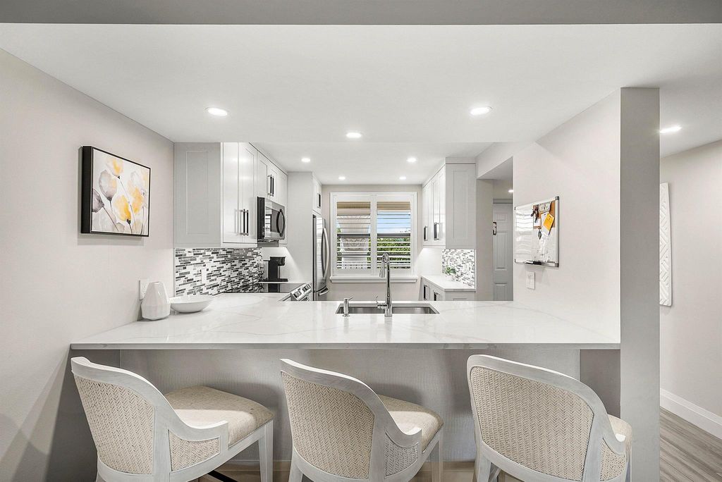 Photo of 6061 Balboa Circle #403, Boca Raton, FL 33433 (MLS # R11135129)
