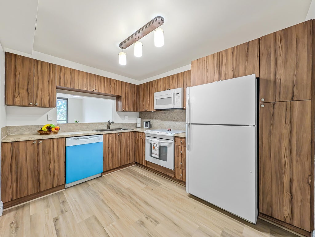 Photo of 900 Colony Point Circle #205, Pembroke Pines, FL 33026 (MLS # B26079889)