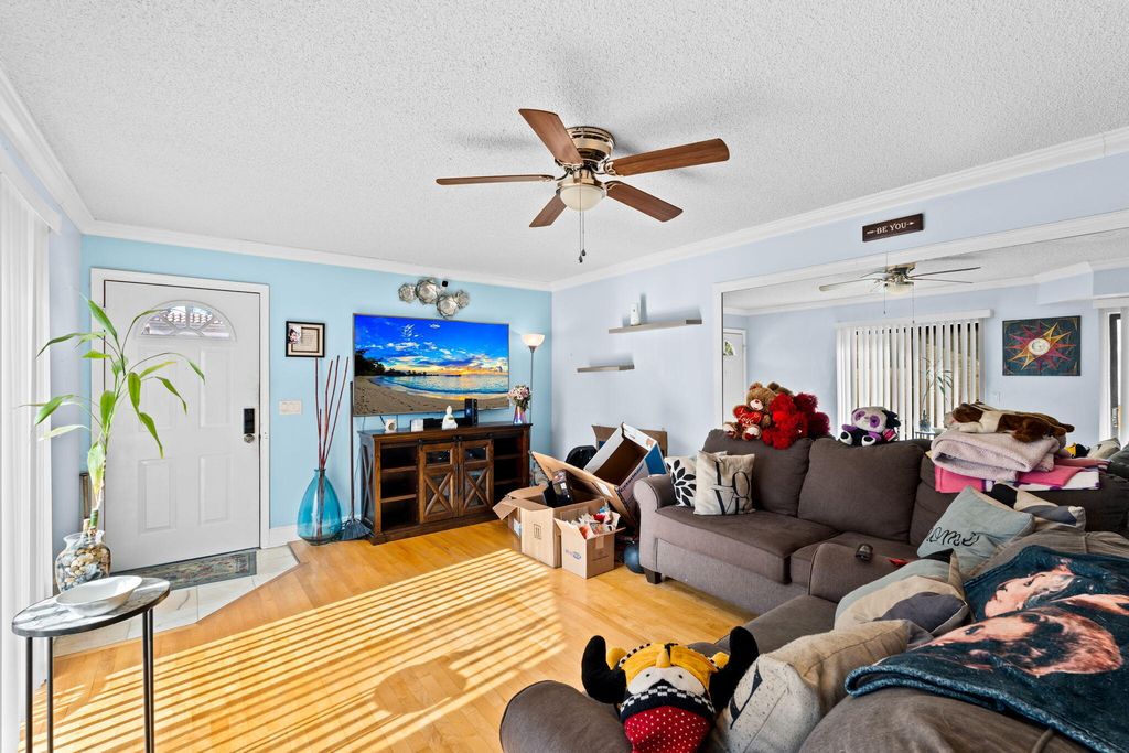 Photo of 6139 Seven Springs Boulevard, Greenacres, FL 33463 (MLS # B26031201)