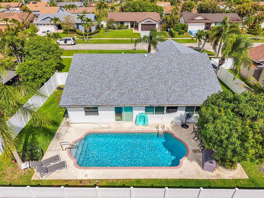 Beautifully renovated home in Southwind Lakes (formerly American Homes) in Boca Raton. Offering approximately 1,600 sq ft of total living space including a versatile additional room ideal for office, playroom, or flex space. Features include a private heated pool, hurricane-impact soundproof windows, and brand-new appliances throughout. The updated primary bathroom includes a high-end smart toilet. Additional highlights include a Tesla charger, two-car garage with two extra refrigerators, and an extended driveway with parking for up to four vehicles. Bright, open layout perfect for modern living and entertaining. Located in a well-established community close to shopping, dining, parks, and top-rated schools.