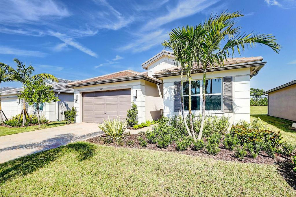 Photo of 13549 SW Oceanus Boulevard, Port Saint Lucie, FL 34987 (MLS # R10930089)