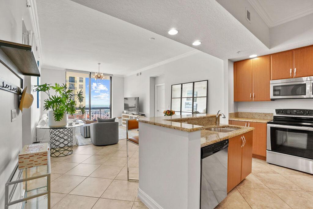 Annual or Seasonal Rental - Welcome to your luxurious and impeccably designed 2 bed, 2 bath apartment with study in one of the premier condo buildings in downtown West Palm Beach. Features include a spacious and open living area, kitchen and large windows that provide breathtaking views and tons of natural light. The primary bedroom includes a luxurious spa-like en suite bathroom featuring a deep soaking tub, separate glass-enclosed shower, and double vanities. Enjoy access to an array of exceptional amenities including a world class fitness center, rooftop pool with stunning city views, clubroom, valet parking and a 24-hour concierge security desk
