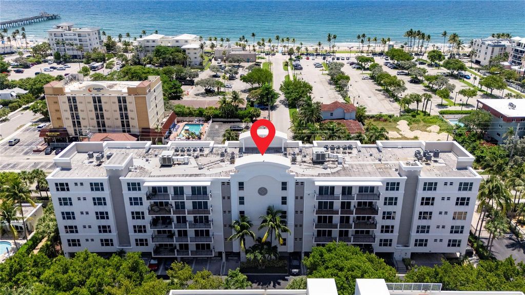 Photo of 101 S Ocean Drive #204, Deerfield Beach, FL 33441 (MLS # F10511286)