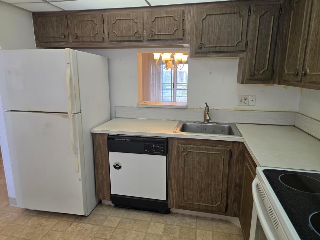 Photo of 3590 Via Poinciana #509, Lake Worth, FL 33467 (MLS # R11067234)