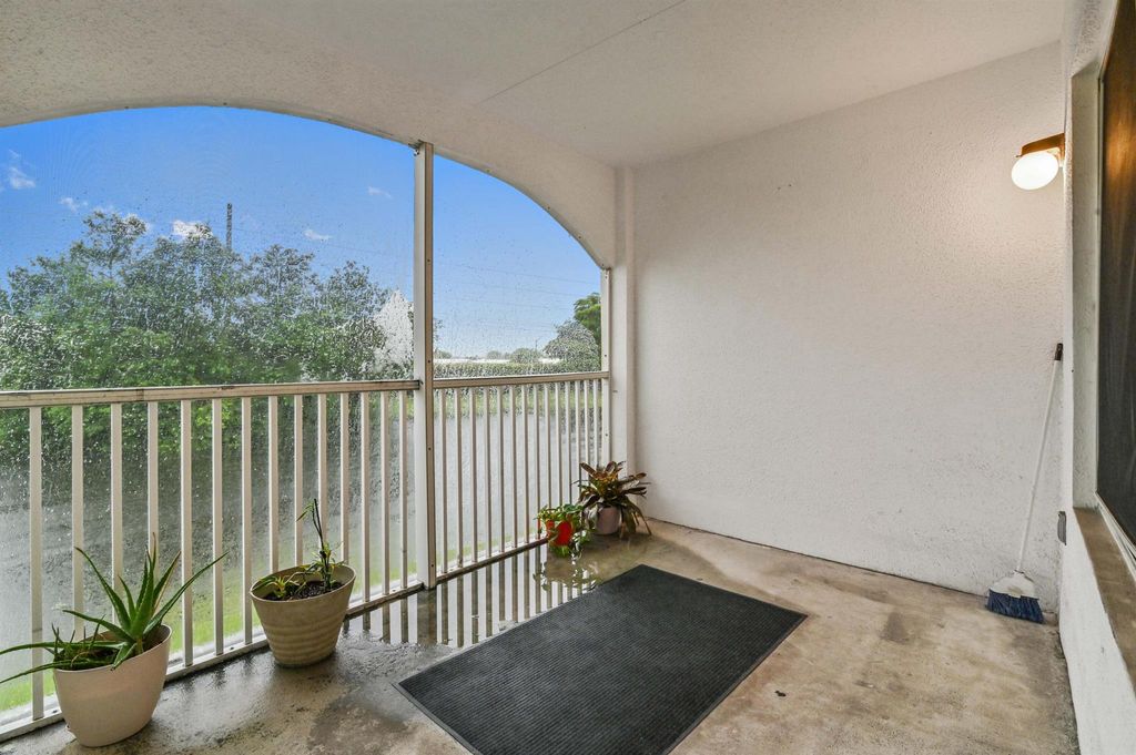 Photo of 815 W Boynton Beach Boulevard #5-202, Boynton Beach, FL 33426 (MLS # R10969072)