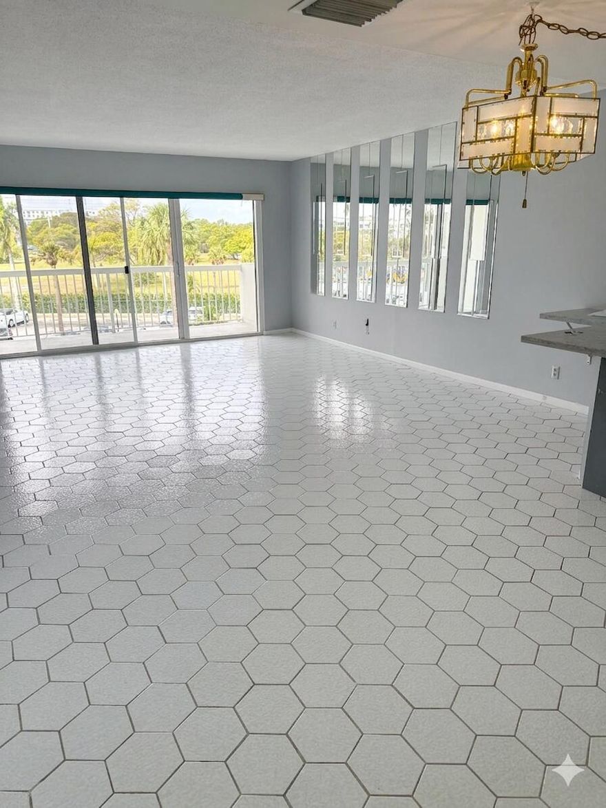 Spacious 1-bedroom, 1.5-bathroom condo located in a desirable waterfront, resort-style community. This bright and inviting unit features modern stone countertops, white cabinetry, brand-new impact sliding glass doors, and like-new appliances, including a recently updated water heater. Enjoy abundant natural light throughout and an unfurnished layout ready for your personal touch. The building offers a secure, gated entrance with 24-hour doorman service, one assigned parking space, and access to a beautifully maintained pool overlooking the Intracoastal Waterway, perfect for relaxing and enjoying scenic views. Located within walking distance to parks, shopping, and dining, this property combines comfort, convenience, and a sought-after coastal lifestyle. Schedule a showing!