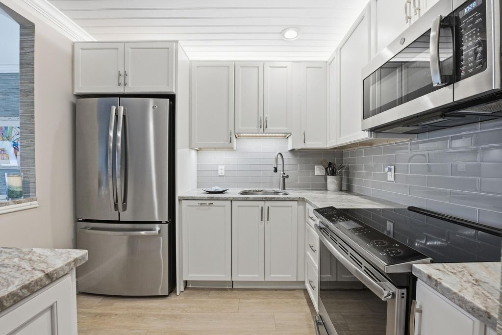 Photo of 111 Shore Court #305-C, Juno Beach, FL 33408 (MLS # R11165117)