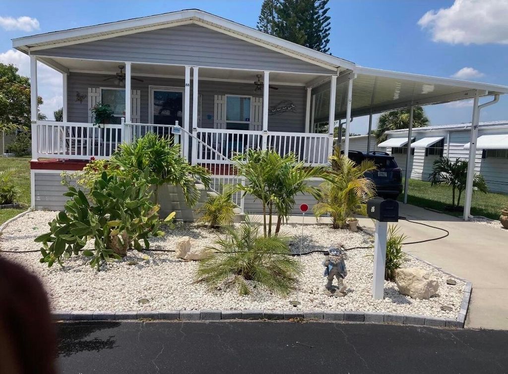 Photo of 88 Sandhill Boulevard, Fort Pierce, FL 34982 (MLS # B26001597)