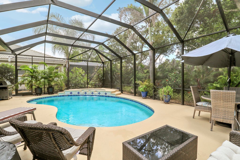 Photo of 7664 Greenbrier Circle, Port Saint Lucie, FL 34986 (MLS # B26058316)