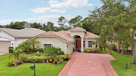 Photo of 7664 Greenbrier Circle, Port Saint Lucie, FL 34986 (MLS # B26058316)