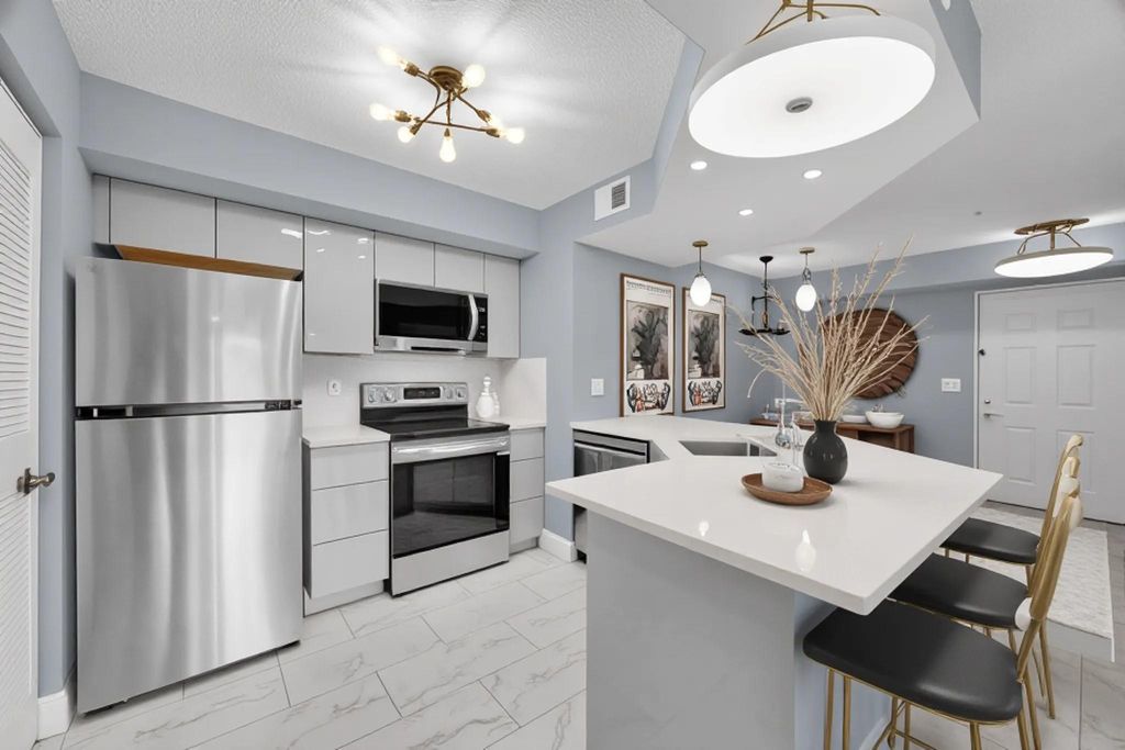 Photo of 3809 NW Mediterranean Lane #104, Jensen Beach, FL 34957 (MLS # F10529835)