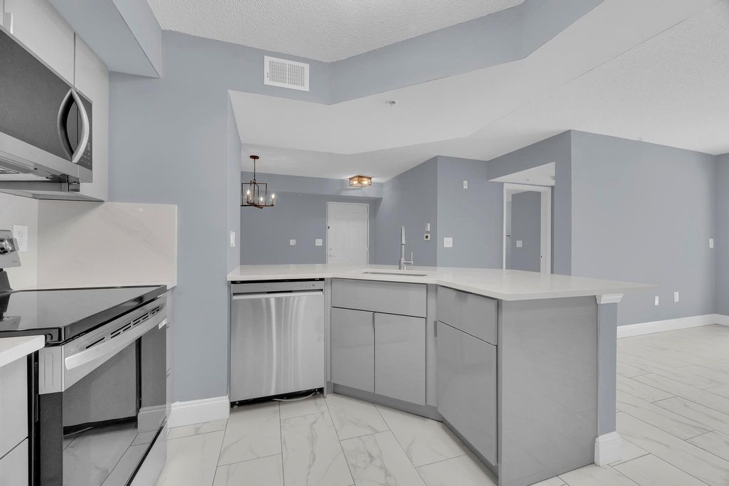 Photo of 3809 NW Mediterranean Lane #104, Jensen Beach, FL 34957 (MLS # F10529835)