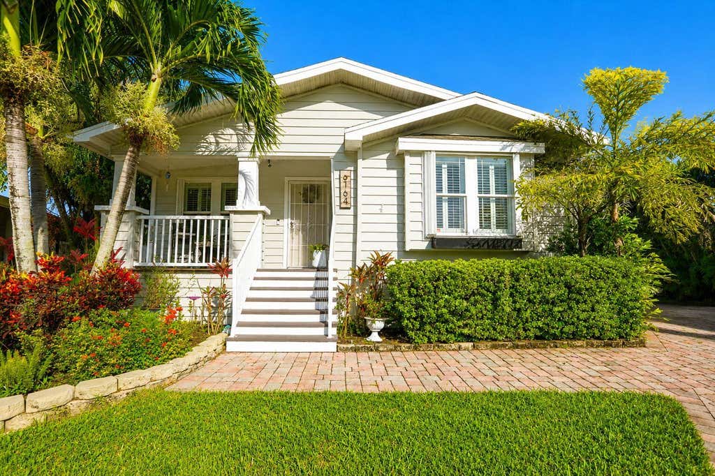 Photo of 6164 N Ironwood Lane, Atlantis, FL 33462 (MLS # B26063293)