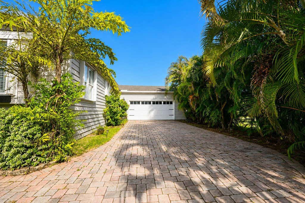 Photo of 6164 N Ironwood Lane, Atlantis, FL 33462 (MLS # B26063293)
