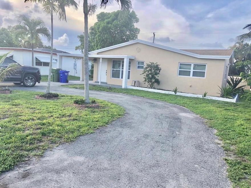 Spacious 1,447 sqft Pembroke Pines home featuring bright living areas, a functional kitchen, and tile floors throughout. This home offers 3 bedrooms and 2 bathrooms, a large fenced backyard perfect for outdoor living, washer and dryer hookups, and driveway parking. Conveniently located near top Pembroke Pines schools, shopping, dining, and major highways, making it a prime location for families or professionals.