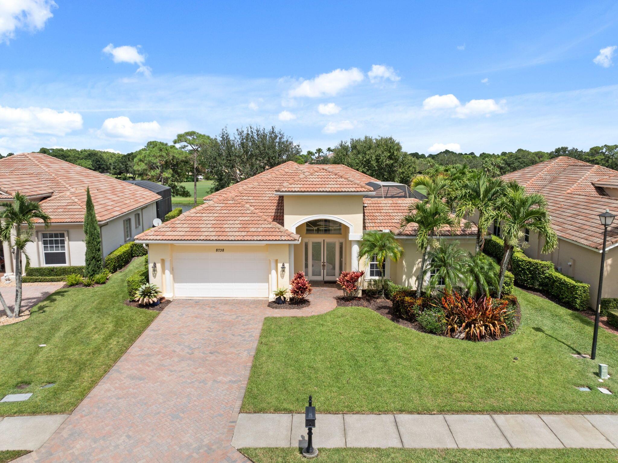 Welcome to courtyard living at its finest! This beautiful pool home is designed for enjoying Florida living, with easy access to the sparkling pool and spa from nearly every room. Imagine relaxing with sweeping golf course and water views right from your backyard!Inside, the Breckenridge floor plan offers plenty of space with 4 bedrooms--each with its own private en-suite bathroom. The layout includes a formal dining room that flows into a bright formal living space, plus a cozy family room right off the kitchen--perfect for gathering with friends and family.The gourmet kitchen is a chef's dream, featuring 42'' upper cabinets, granite countertops, and stainless steel appliances.Located in the sought-after PGA Village, you'll have access to 3 championship golf courses (open to the public)