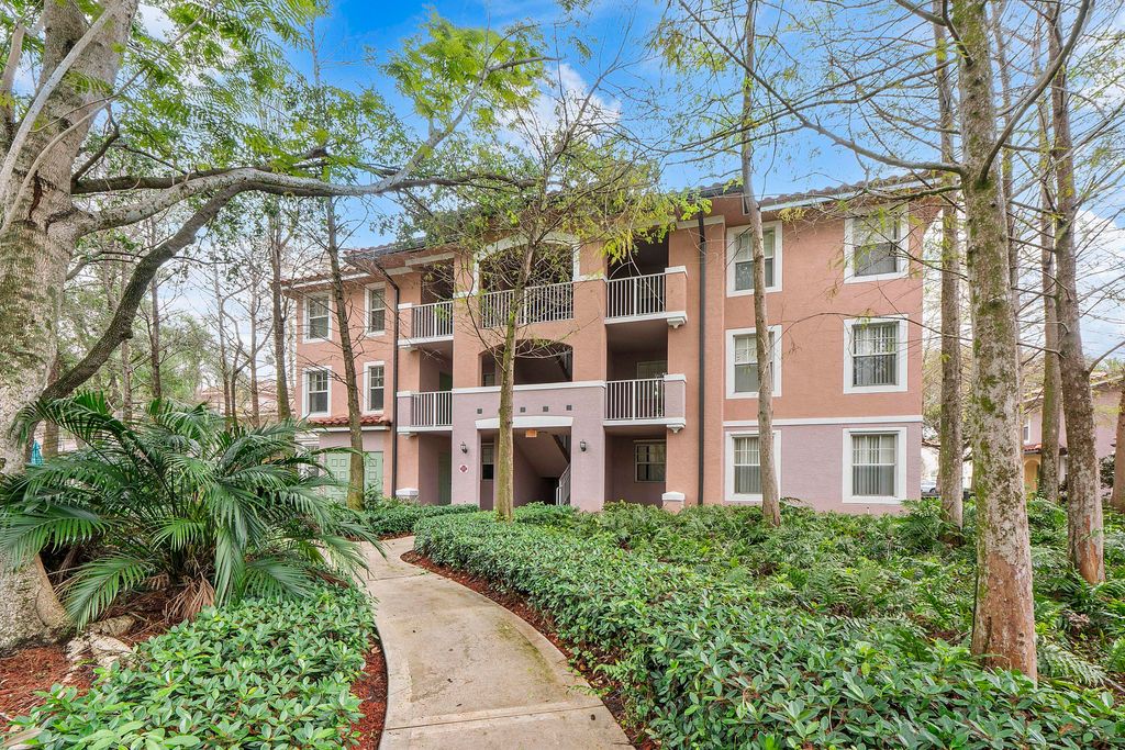 Photo of 6592 W Sample Road #6592, Coral Springs, FL 33067 (MLS # B26006346)