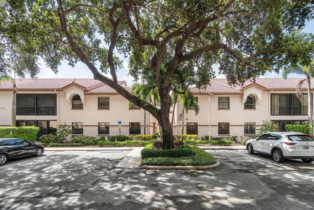 Photo of 5188 EUROPA Drive #C, Boynton Beach, FL 33437 (MLS # B26088650)