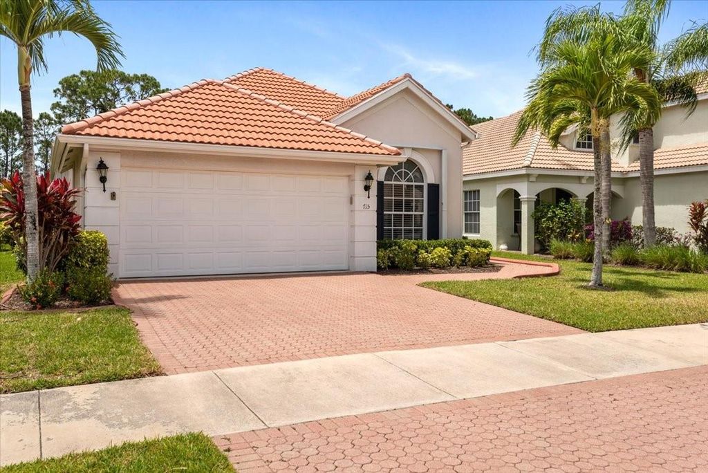 Photo of 715 SW Munjack Circle, Port Saint Lucie, FL 34986 (MLS # F10436849)