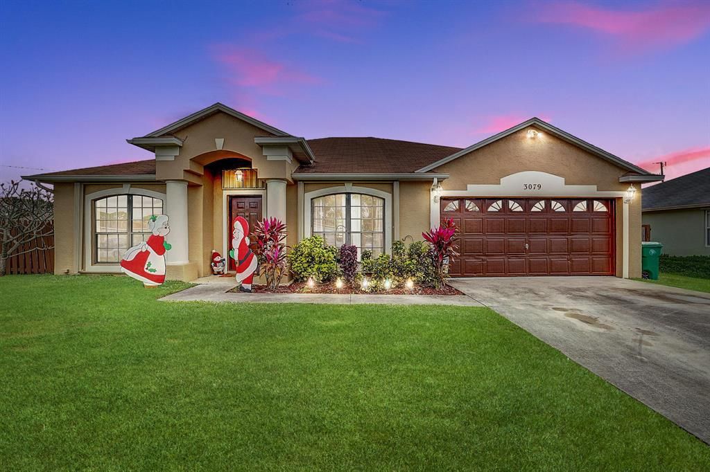 Photo of 3079 SW Lucerne, Port Saint Lucie, FL 34953 (MLS # R10765068)