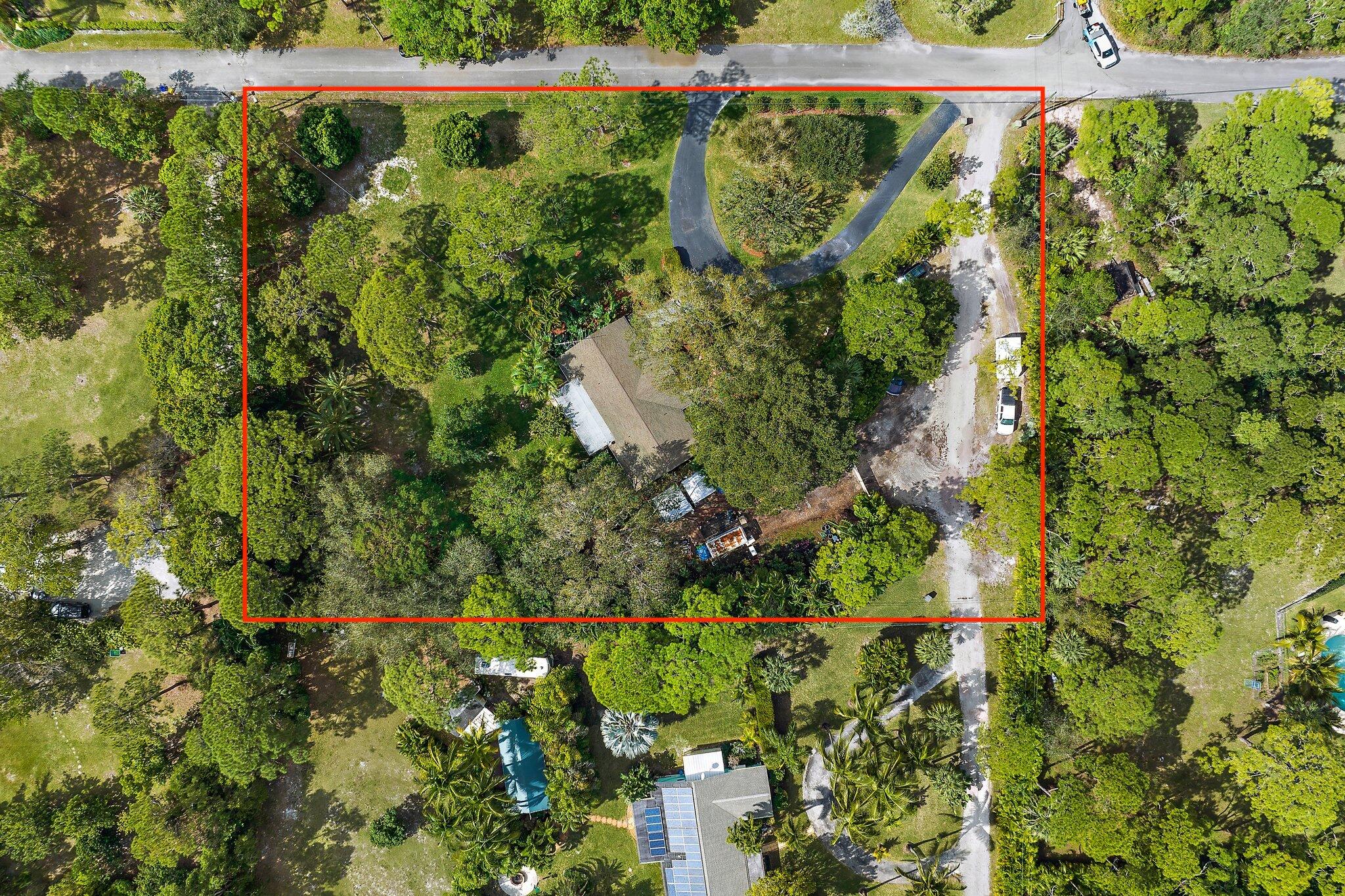 Hidden gem of a neighborhood in Jupiter right off Loxahatchee River Rd. This prime property is one of the largest parcels east of I95, boasting 1.67 unrestricted beautiful acres. Tucked away in a neighborhood of homes on one acres or more, in the heart of Jupiter minutes away from world class golf courses, waterfront hot spots, fine dining and some of the finest beaches and fishing in South Florida. Not to mention A-rated schools and easy access to I-95. An existing 1250 sq ft home makes it an ideal investment for anyone looking to expand or build their dream home. No shortage of options and potential!