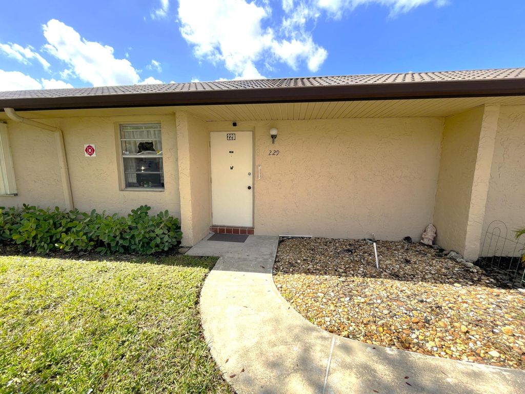 Photo of 229 Lake Meryl Drive, West Palm Beach, FL 33411 (MLS # R11164521)