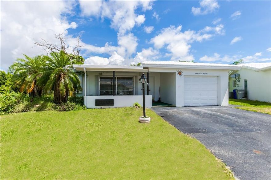 THIS 2/3 BED 2 BATH 1 CAR GAR WHERE 3RD BEDROOM (WITH PRIVATE ENTRANCE) COULD BE OFFICE/DEN LOCATED IN 55+ COMM WHERE YOU CAN GOLF FOR FREE OR FLOAT IN ONE OF THE TWO BEAUTIFUL COMMUNITY POOLS, OR GET IN YOUR CAR AND DRIVE TO POMPANO BEACH APPROX 4 MILES. COMMUNITY HAS SHUTTLE BUS.  TILE THROUGHOUT, TANKLESS H20 HEATER, UPDATED ELECTRICAL PANEL, ACCORDIAN SHUTTERS. ROOF PAINTED JUNE 2022. PET FRIENDLY AND RENT IMMEDIATELY. NOOO POPCORN CEILINGS. WITH  INTERIOR PAINTING, MAYBE SOME NEW INTERIOR DOORS AND UPDATES TO GUEST BATH AND SOME LANDSCAPING THIS HOME COULD BE YOUR COMFORTABLE PARADISE... THIS 2/3 BED 2 BATH 1 CAR GAR WHERE 3RD BEDROOM (WITH PRIVATE ENTRANCE) COULD BE OFFICE/DEN LOCATED IN 55+ COMM WHERE YOU CAN GOLF FOR FREE OR FLOAT IN ONE OF THE TWO BEAUTIFUL COMMUNITY POOLS, OR GET IN YOUR CAR AND DRIVE TO POMPANO BEACH APPROX 4 MILES. COMMUNITY HAS SHUTTLE BUS.  TILE THROUGHOUT, TANKLESS H20 HEATER, UPDATED ELECTRICAL PANEL, ACCORDIAN SHUTTERS. ROOF PAINTED JUNE 2022. PET FRIENDLY AND RENT IMMEDIATELY. NOOO POPCORN CEILINGS. WITH  INTERIOR PAINTING, MAYBE SOME NEW INTERIOR DOORS AND UPDATES TO GUEST BATH AND SOME LANDSCAPING THIS HOME COULD BE YOUR COMFORTABLE PARADISE...