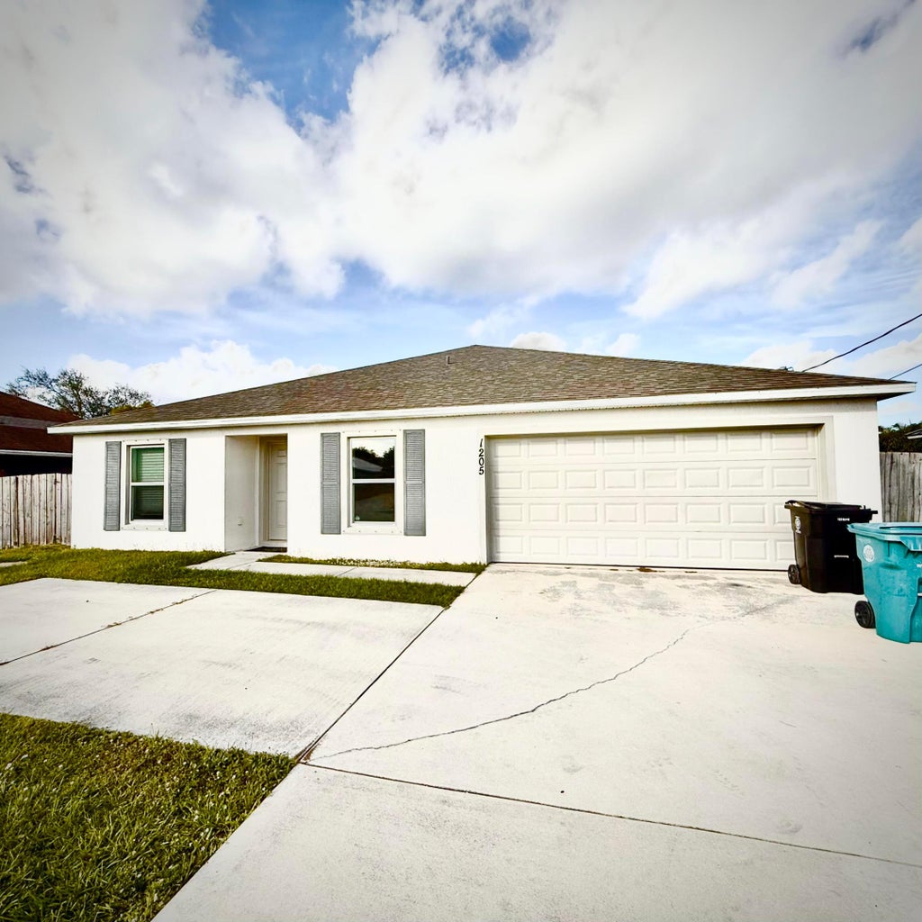 Photo of 1205 SW Alcantarra Boulevard, Port Saint Lucie, FL 34953 (MLS # R11149674)