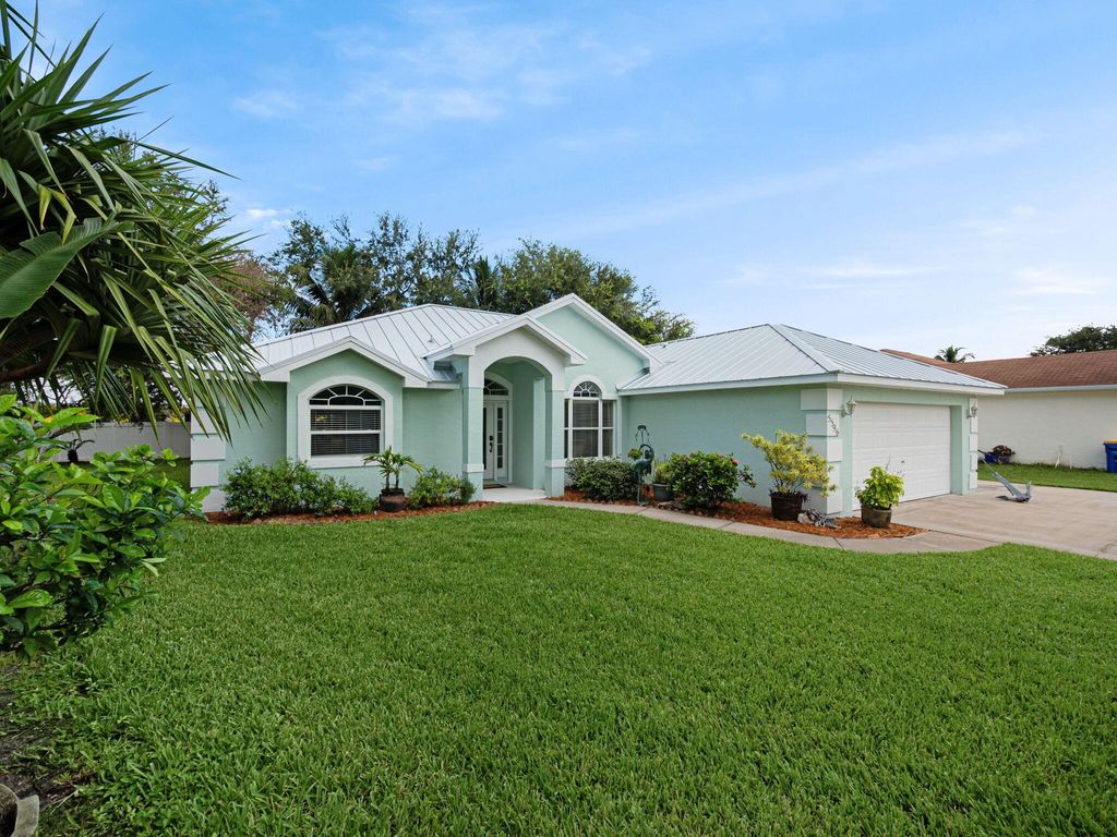 Photo of 5596 SE Sailfish Way, Stuart, FL 34997 (MLS # R11024287)