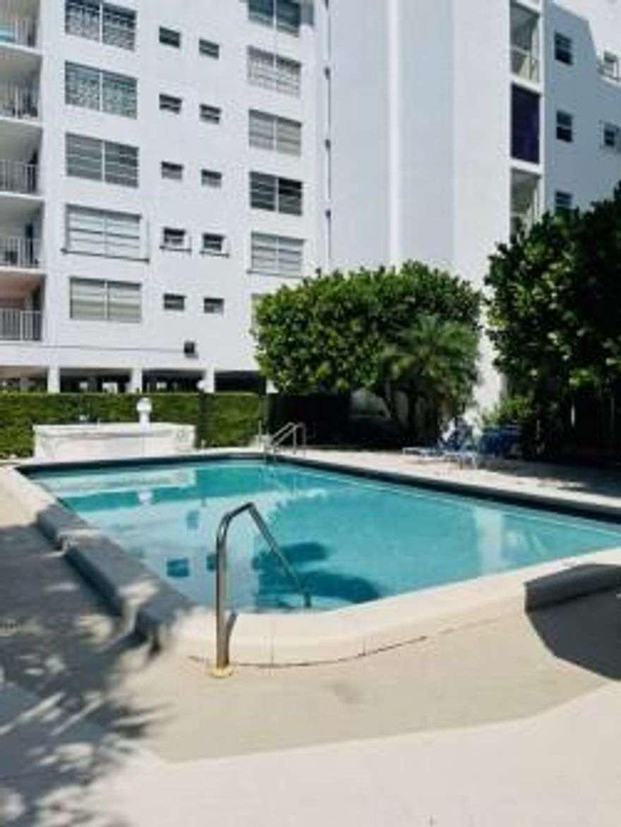 Bright Condo in peaceful Stuart House building. Roomy rooms and kitchen. Lovely balcony facing South. Marble floors in living-dining room. New Tile floors in bedrooms. NO CARPETS AT ALL. Covered garage. Nice pool and deck area. Spacious building lobby.