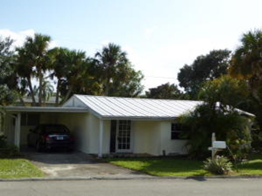 This is a must see home which has newer styled kitchen and bath, a living and dining area as well as a family room or office area perfect for almost anything. The home features 2 bedrooms, Pergo styled floors, nice kitchen and bath cabinetry and is on an oversized lot with a peaceful tranquil setting!