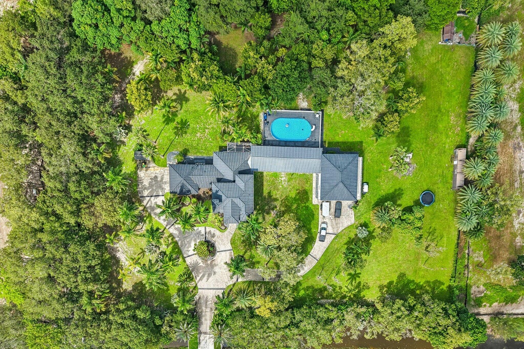 Photo of 6911 NW 84TH Avenue, Parkland, FL 33067 (MLS # B26077504)
