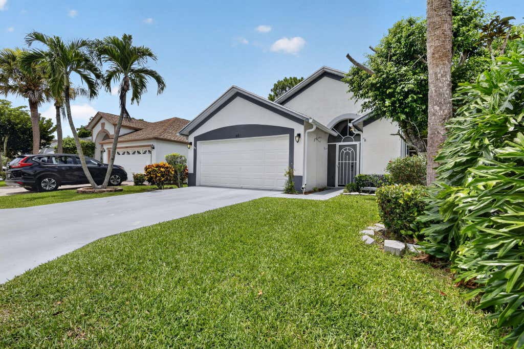 Photo of 412 Trotters Lane, Greenacres, FL 33413 (MLS # R11136218)