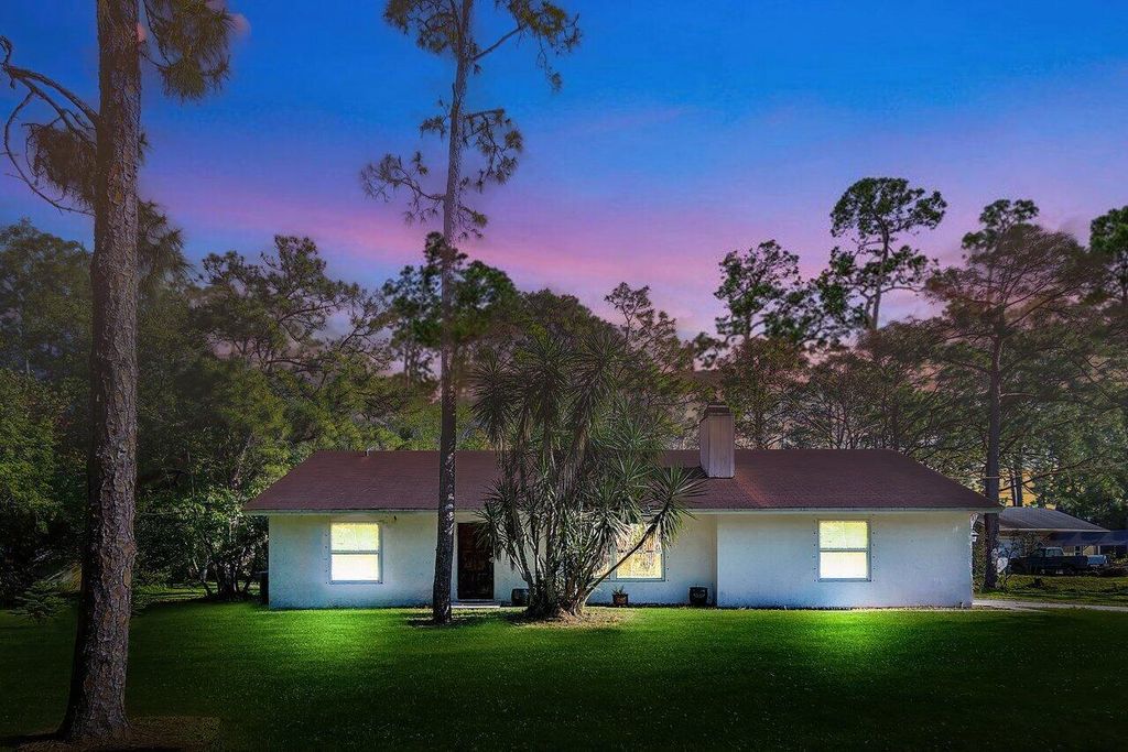 Photo of 11715 52nd Road N, The Acreage, FL 33411 (MLS # R10969149)
