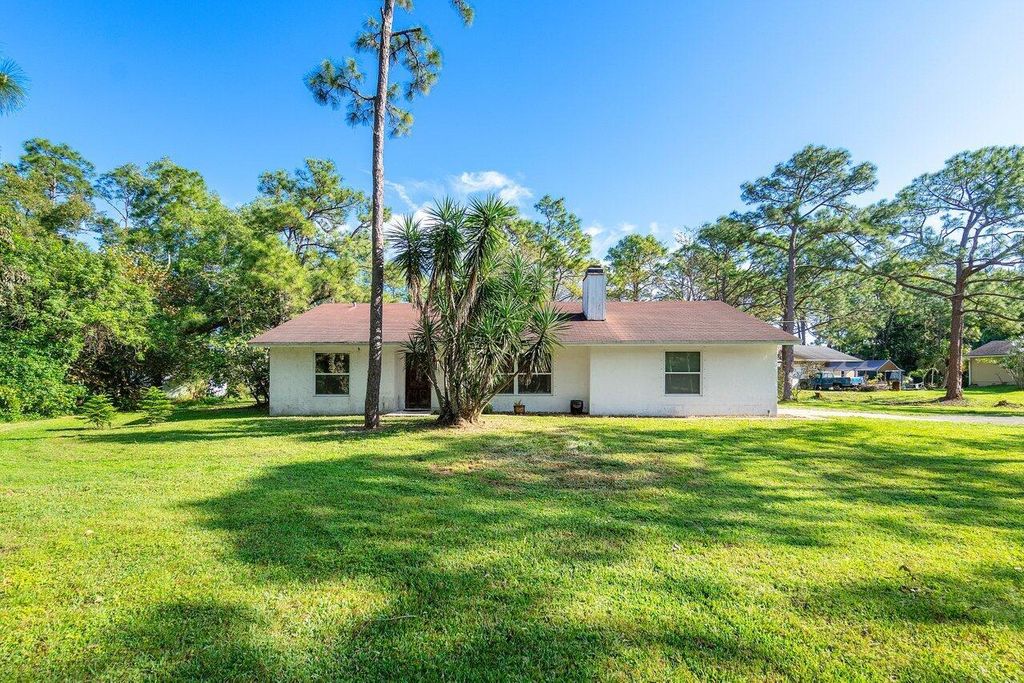 Photo of 11715 52nd Road N, The Acreage, FL 33411 (MLS # R10969149)