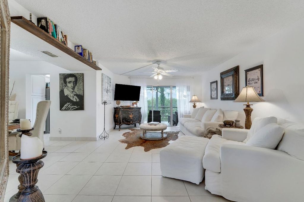 Photo of 3755 Via Poinciana #405, Greenacres, FL 33467 (MLS # R11132323)