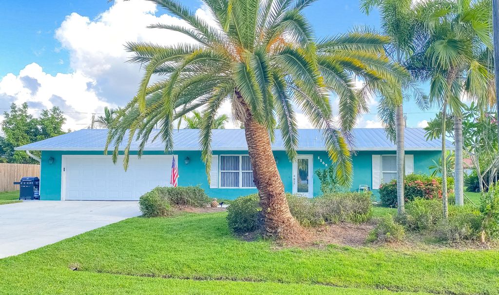 Photo of 1162 SE Palm Beach Road, Port Saint Lucie, FL 34952 (MLS # R10812696)