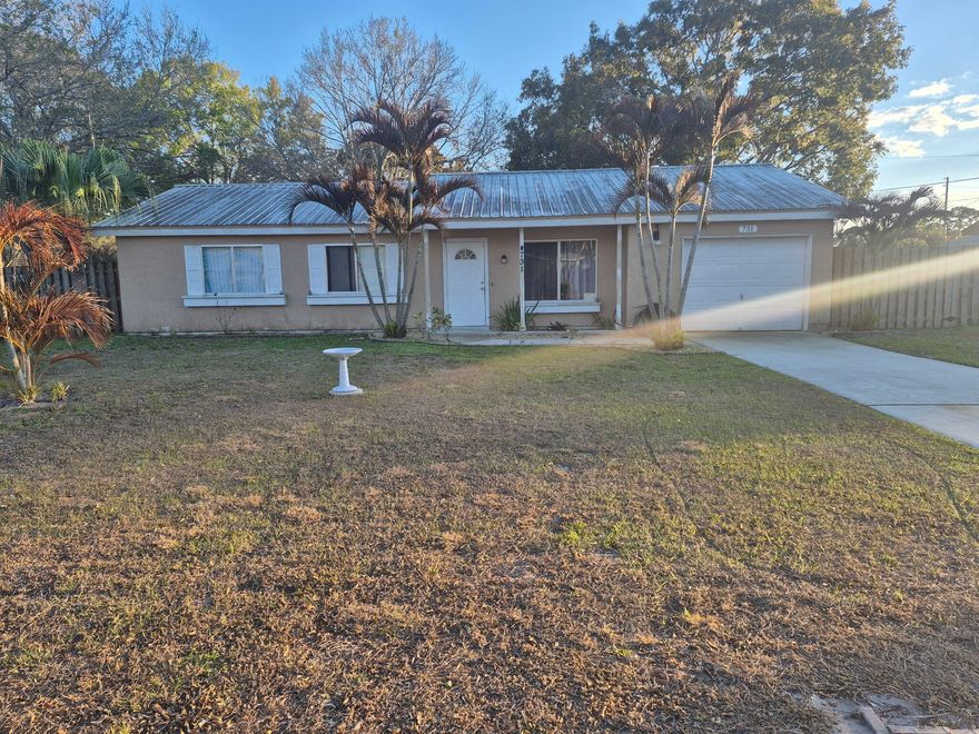 Spacious three-bedroom, two-bath home with 1,638 sq ft of living space, situated on a generous lot with a fenced backyard. The flexible bonus room offers excellent potential for a home office, playroom, or additional living area. Built in 1981, this solid concrete block home features central air and heat and is conveniently located near shopping, dining, and just a short drive to the beaches.

The property presents a great opportunity for buyers looking to personalize a home and build equity. With a little elbow grease and cosmetic updates, this home can truly shine and maximize its full potential. Ideal for owner-occupants or investors seeking a value-add opportunity in a desirable location.