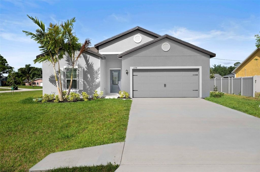 Photo of 1298 SW Empire Street, Port Saint Lucie, FL 34983 (MLS # F10460031)