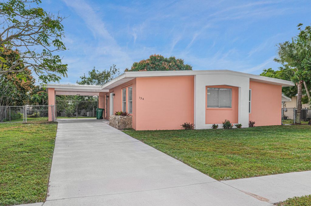 Photo of 134 NE Tunison Avenue NE, Port St Lucie, FL 34983 (MLS # R10865562)