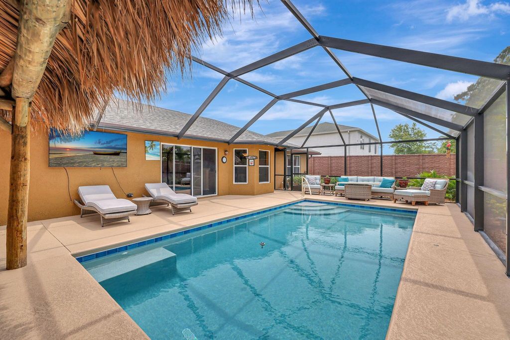 Photo of 1590 SW Bermel Avenue, Port Saint Lucie, FL 34953 (MLS # R10998003)