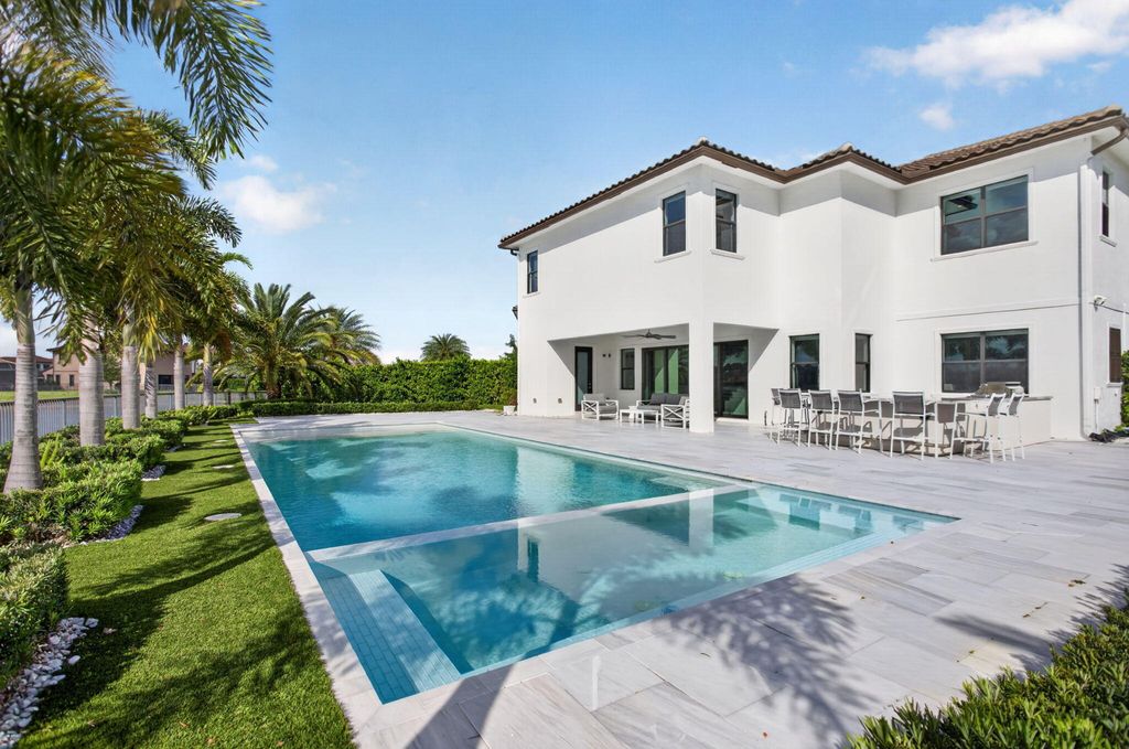 Photo of 11930 Watermark Way, Parkland, FL 33076 (MLS # B26018368)