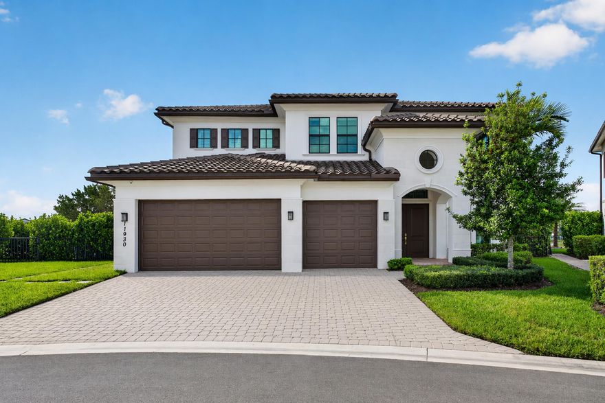 Exquisite two-story home featuring 5 bedrooms, 6 bathrooms, a loft, and a great room within 4,255 square feet of air-conditioned space. Set on an oversized pie-shaped lot, this residence boasts a stunning 22-foot ceiling in the living room and seamless flow between the living, dining, and family areas. Enjoy indoor-outdoor living with a covered terrace, a first-floor guest bedroom, and four additional bedrooms upstairs. The gourmet kitchen features high-end Monogram appliances and a spacious island, along with ample storage. Elegant touches include wood stairs, crown molding, a fully equipped outdoor kitchen, and a heated pool and spa surrounded by lush landscaping. The luxurious master bathroom offers Floridian blinds for privacy. This majestic home combines comfort and sophistication.
