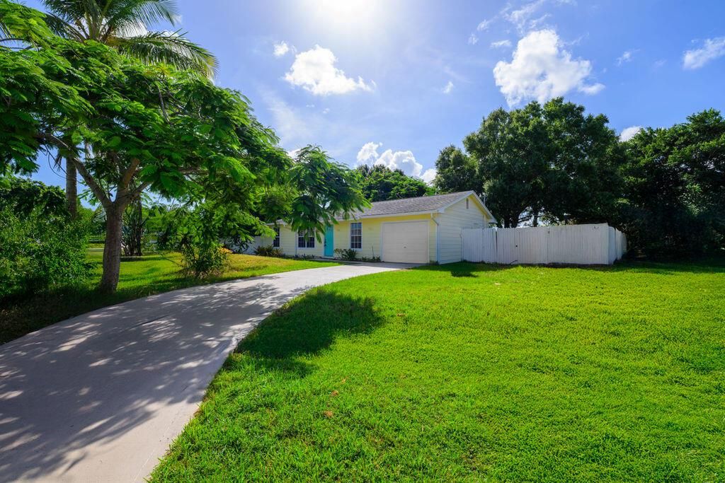 Photo of 1875 SE Camilo Street, Port Saint Lucie, FL 34952 (MLS # R11113649)