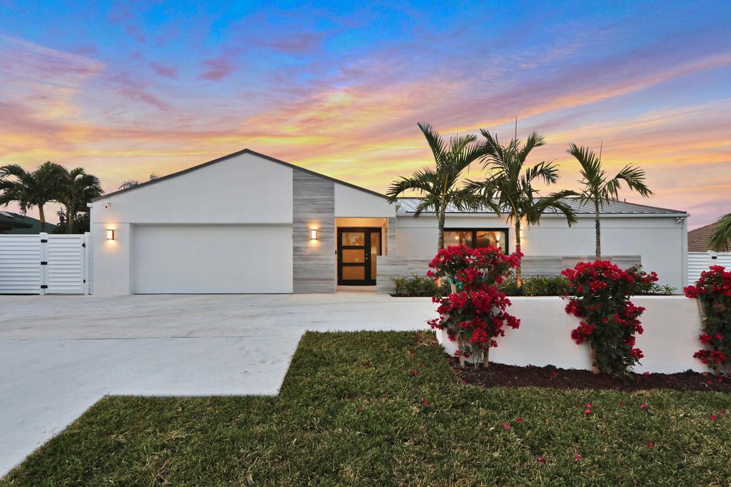 Photo of 441 S Lyra Circle, Juno Beach, FL 33408 (MLS # R11161401)