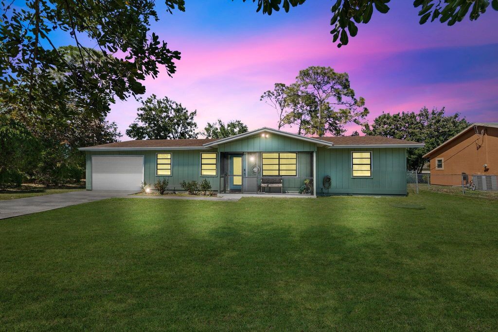 Photo of 287 SW Moselle Avenue, Port Saint Lucie, FL 34984 (MLS # R10972964)