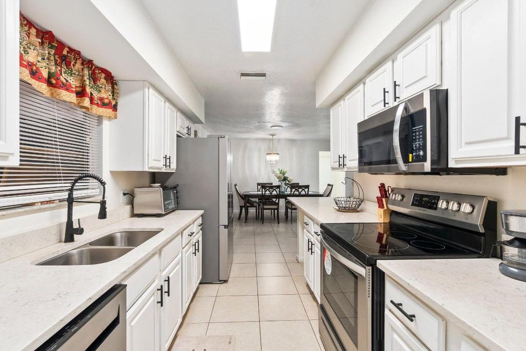 Photo of 287 SW Moselle Avenue, Port Saint Lucie, FL 34984 (MLS # R10972964)